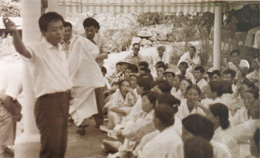 Kimjae church leader Yong-su Seol speaking at an ourdoor meeting