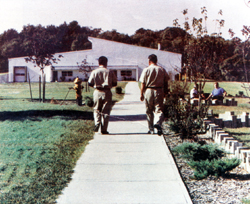 Reverend Moon strolling with Mr. Kamiyama in the prison