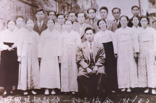 Commemorative photograph of members taken the day after the official founding of the church